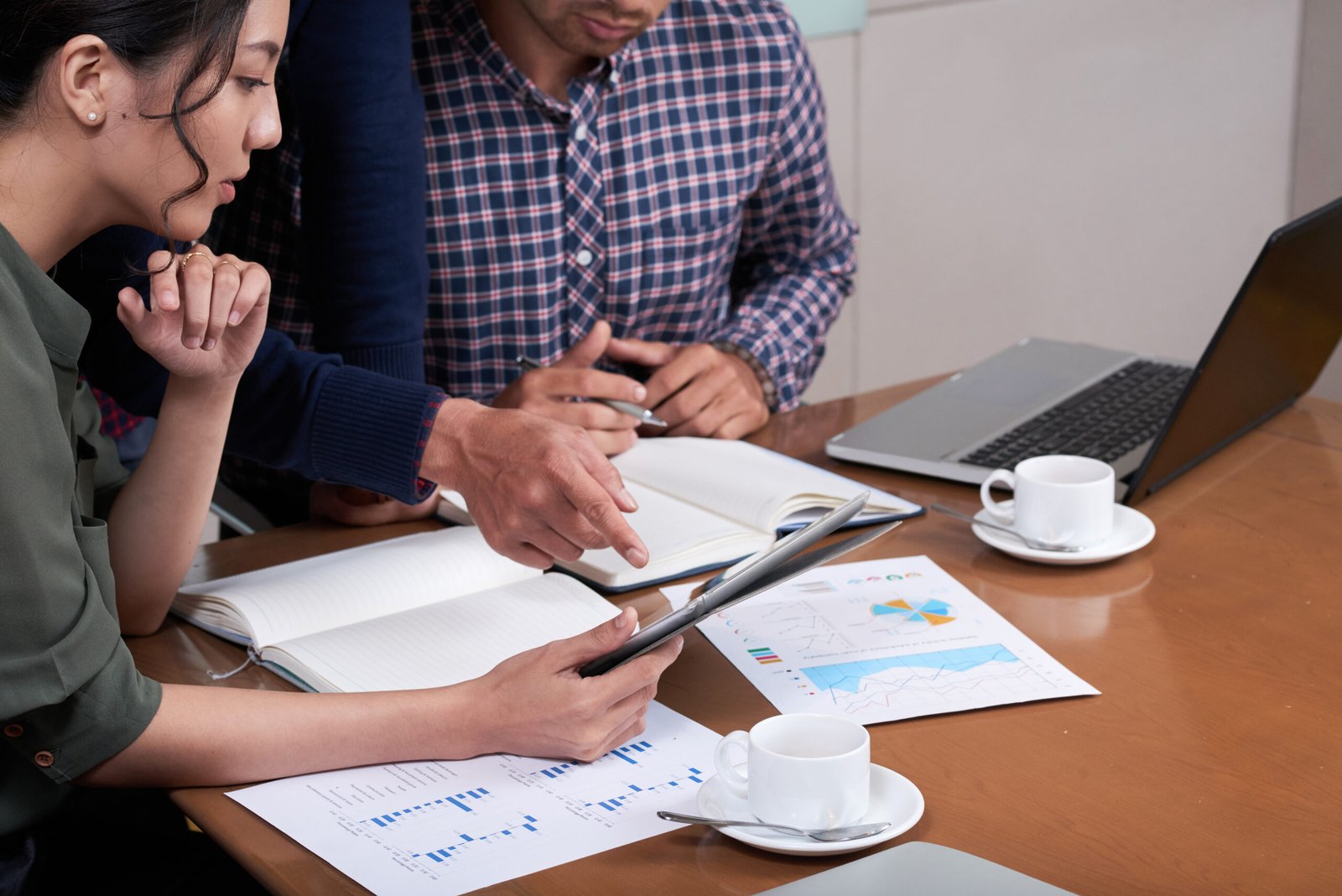 Business team discussing financial charts
